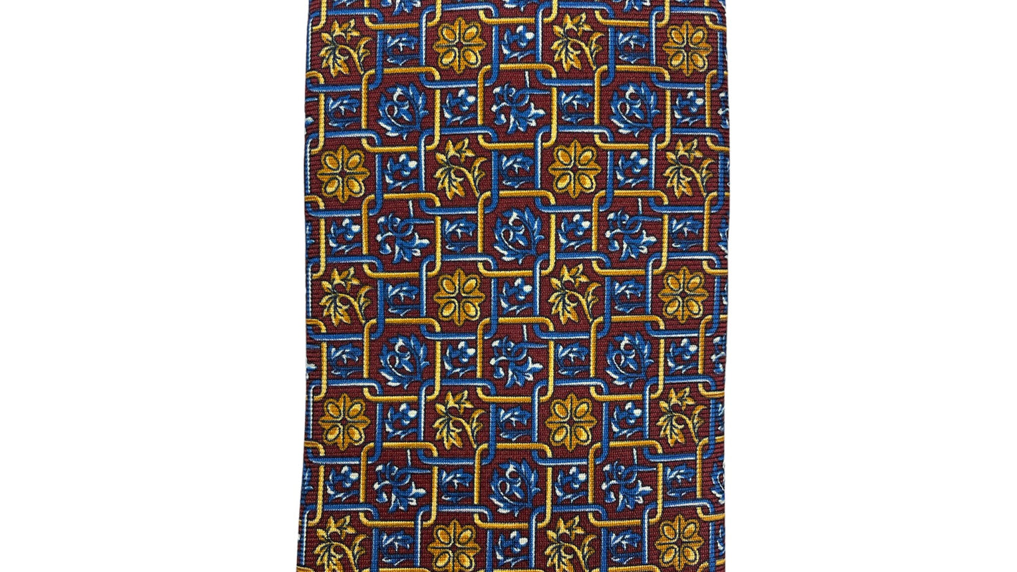 Light blue silk tie with blue flowers and red circles