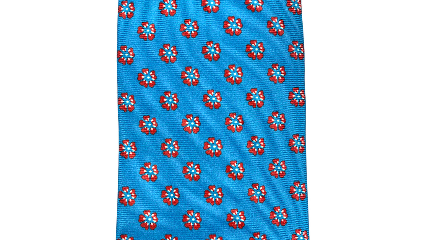 Light blue silk tie with blue flowers and red circles