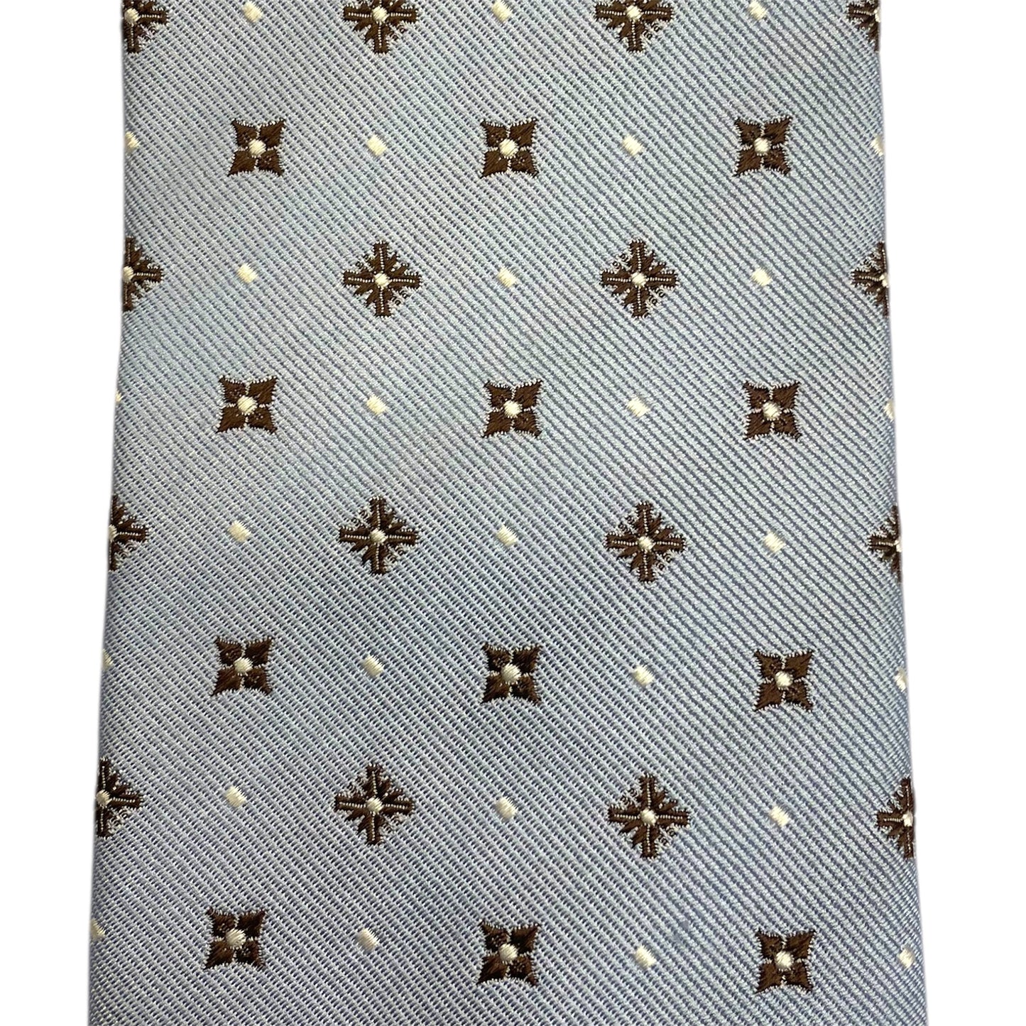 Cravatta seta celeste con fantasia geometrica