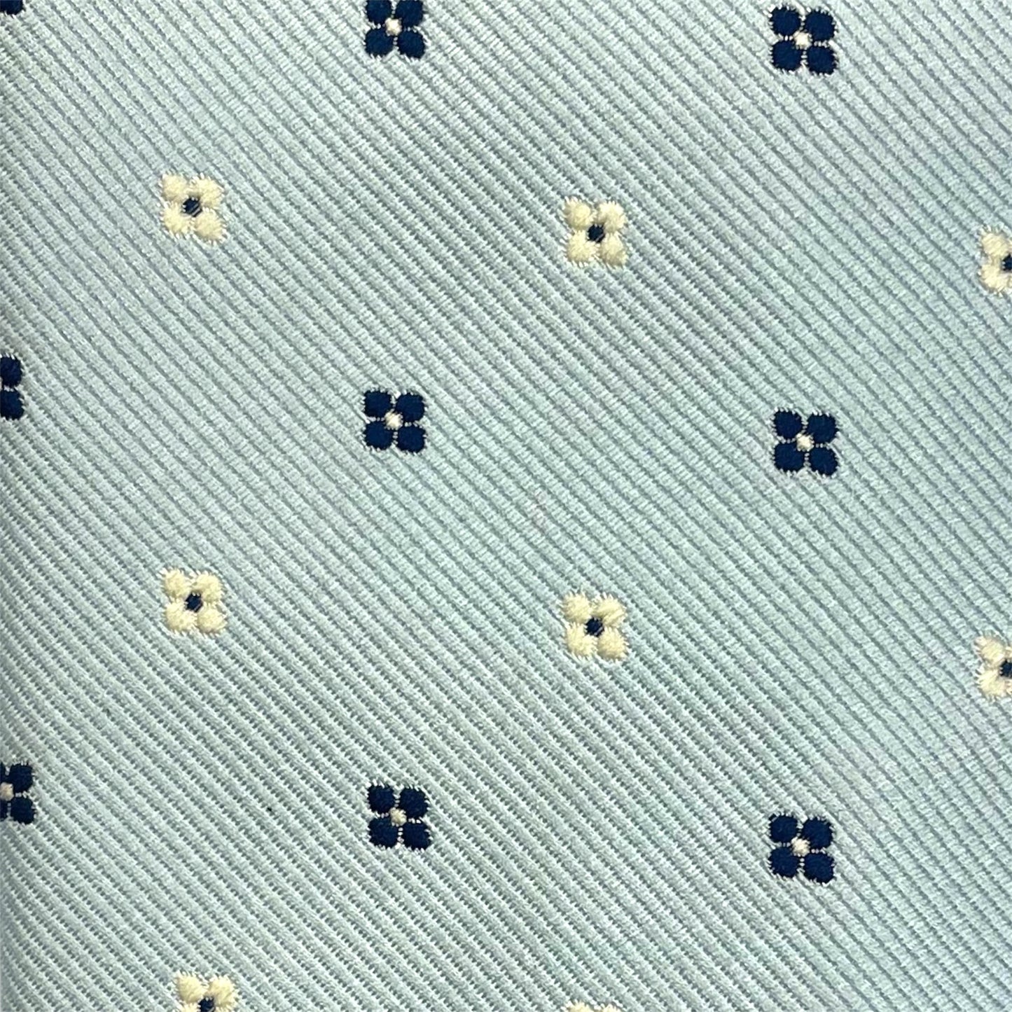 Cravatta seta Azzurra con microfantasia blu e bianca