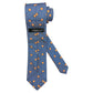 Light blue silk tie with blue flowers and red circles