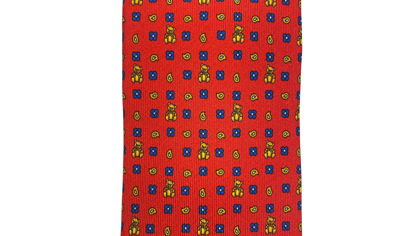 Light blue silk tie with blue flowers and red circles