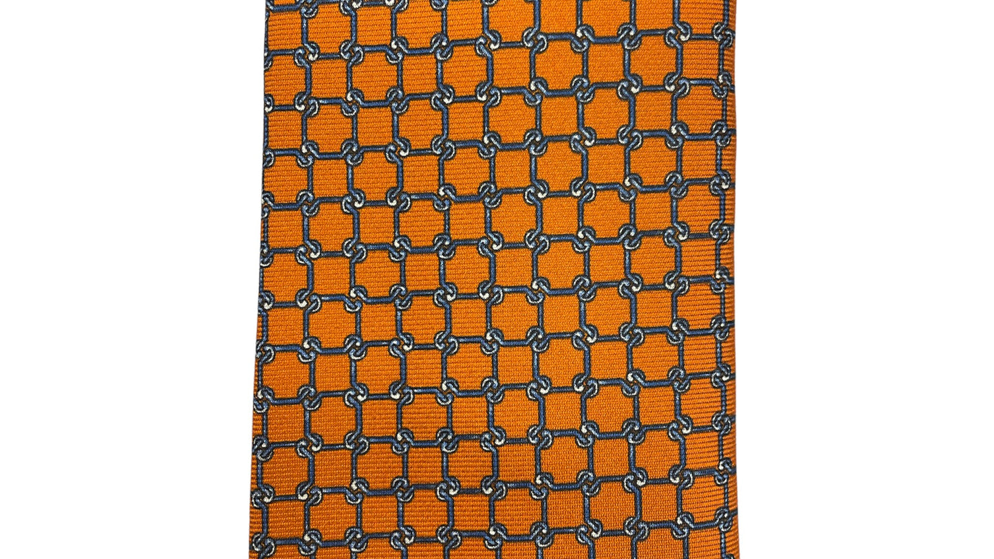 Cravatta seta arancio con fantasia catene